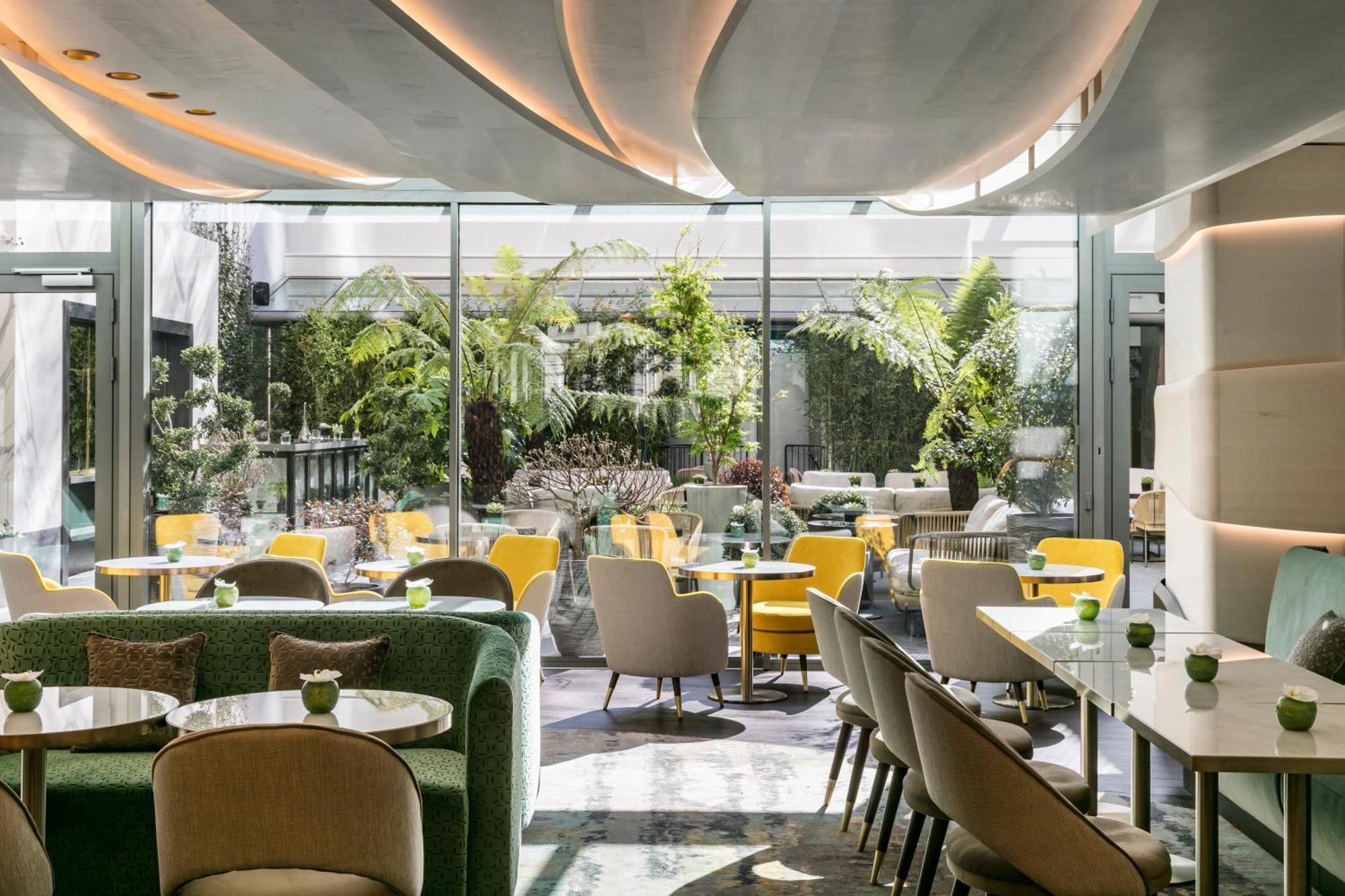 โฮเทล ดู กอลเลคชั่นเนอ อาร์ก เดอ ทริยมฟ์ Hotel ปารีส ภายนอก รูปภาพ The restaurant